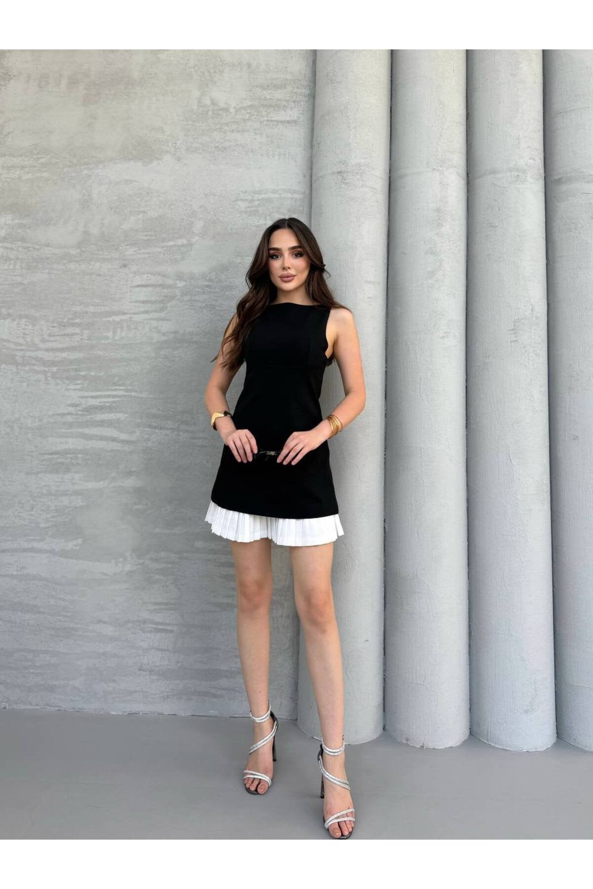 KADIN ETEĞİ PİLİSE DETAYLI ATLAS KUMAŞ KOLSUZ ELBİSE