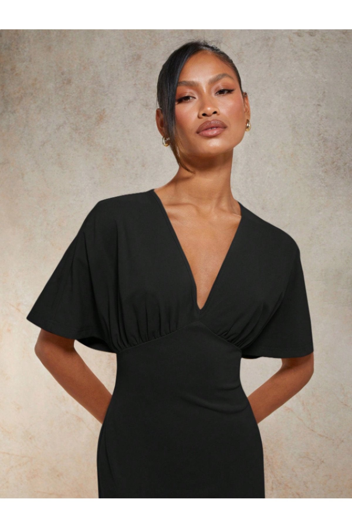 KADIN V YAKA MELEK KOL GÖĞSÜ BÜZGÜ DETAYLI ESNEK ÖRME KUMAŞ UZUN BOY ELBİSE