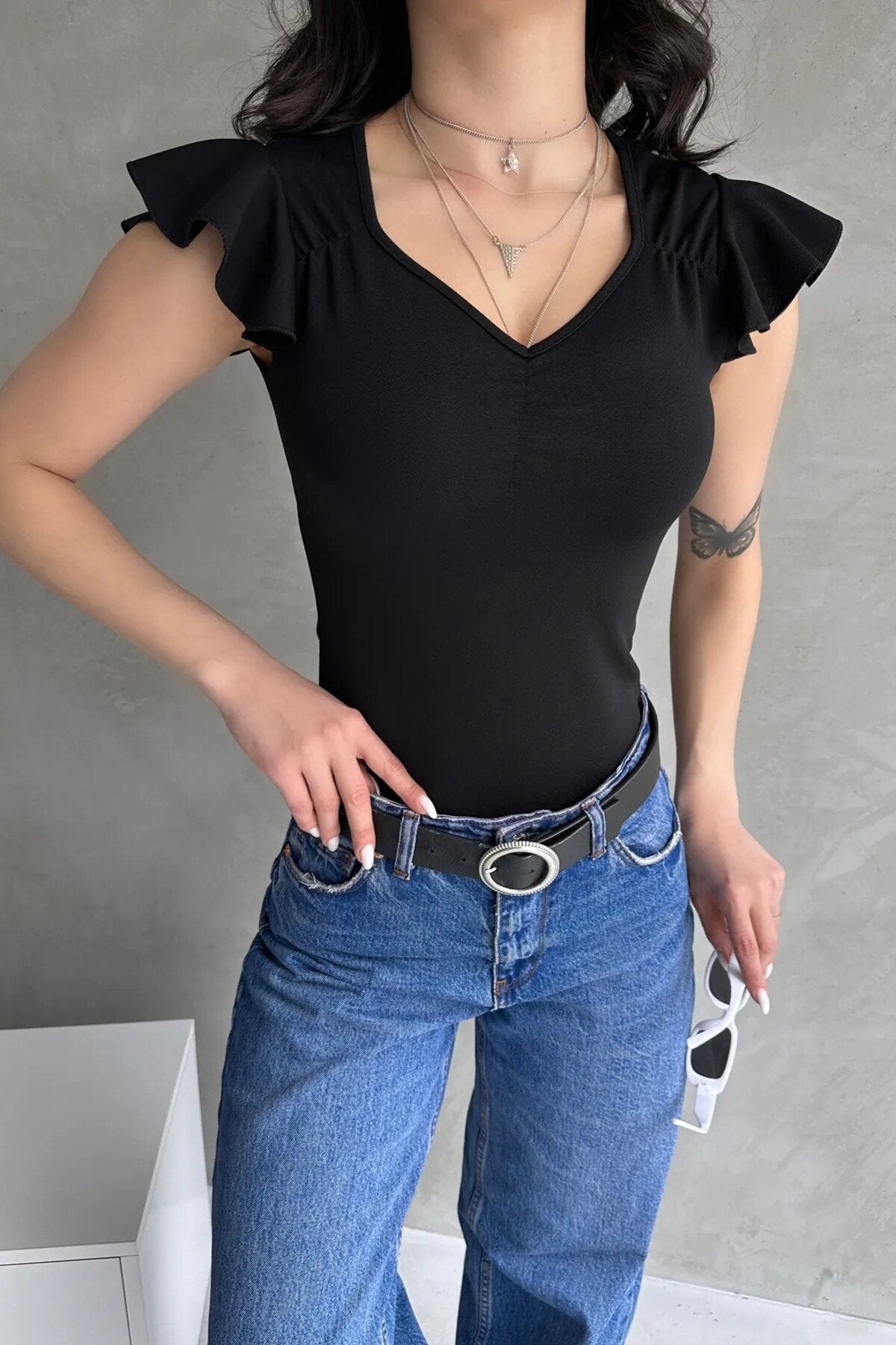 KADIN KALP YAKA ÖNÜ BÜZGÜLÜ OMUZLARI FIRFIRLI ESNEK ÖRME KUMAŞ BLUZ