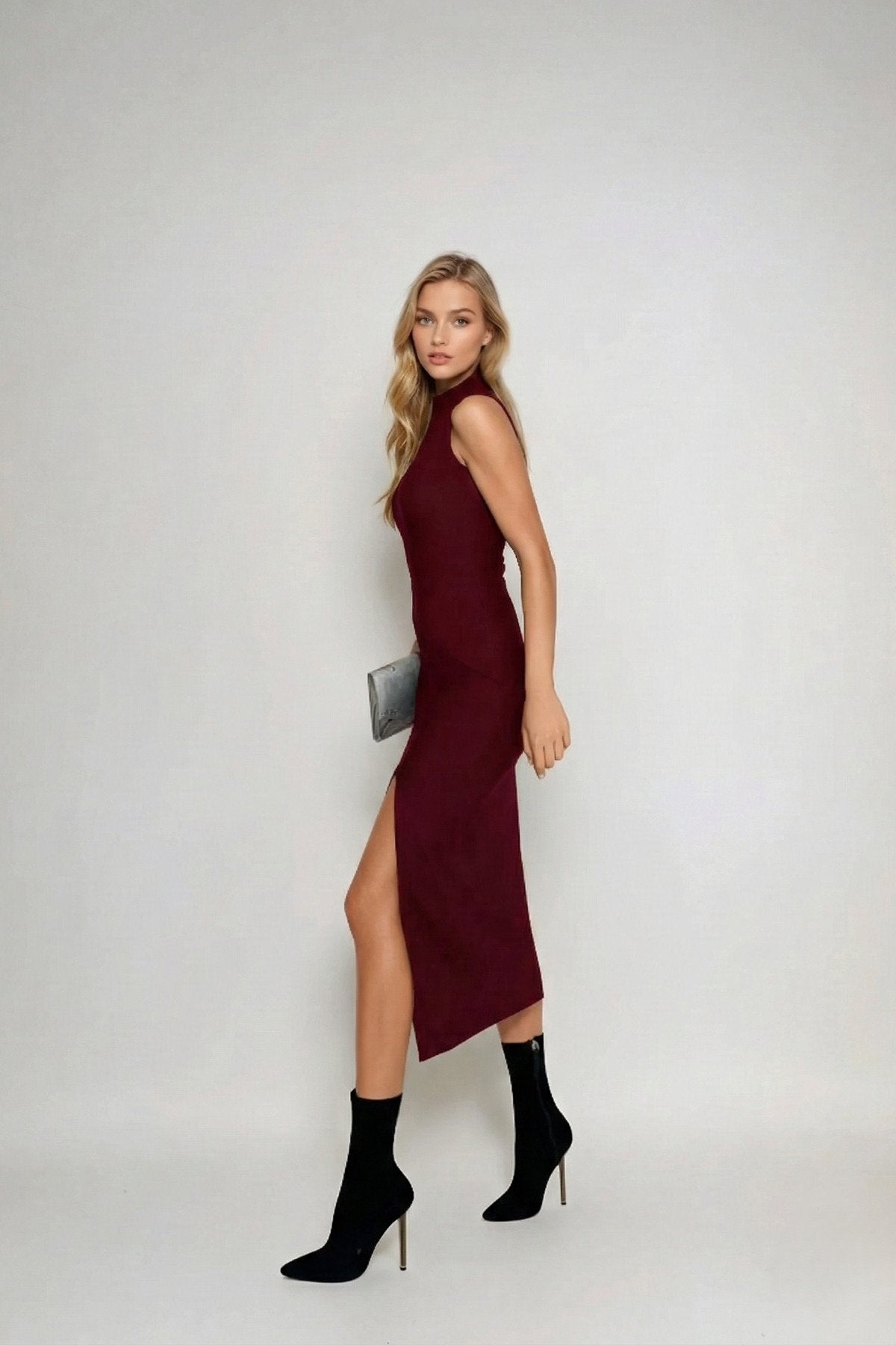 KADIN DİK YAKA KOLSUZ ESNEK KUMAŞ YIRTMAÇLI ELBİSE