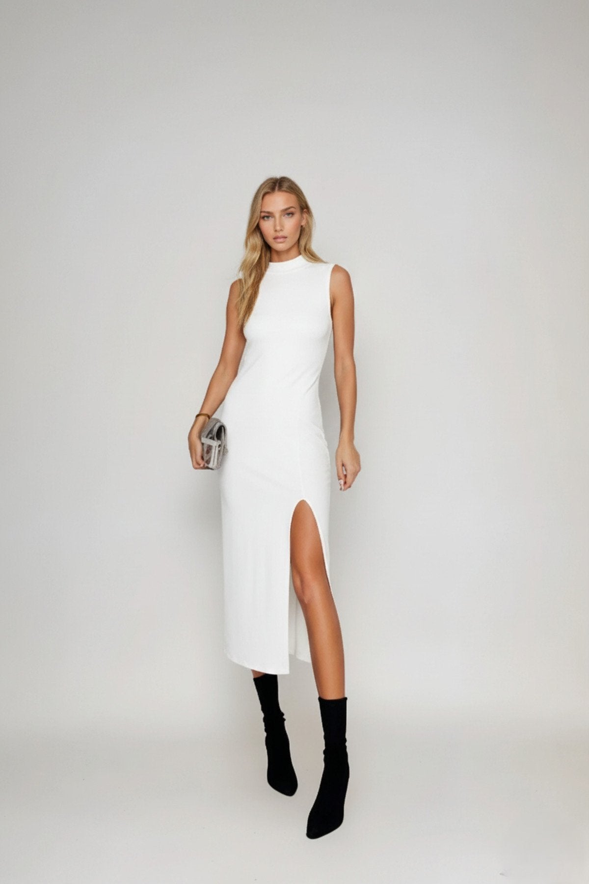 KADIN DİK YAKA KOLSUZ ESNEK KUMAŞ YIRTMAÇLI ELBİSE