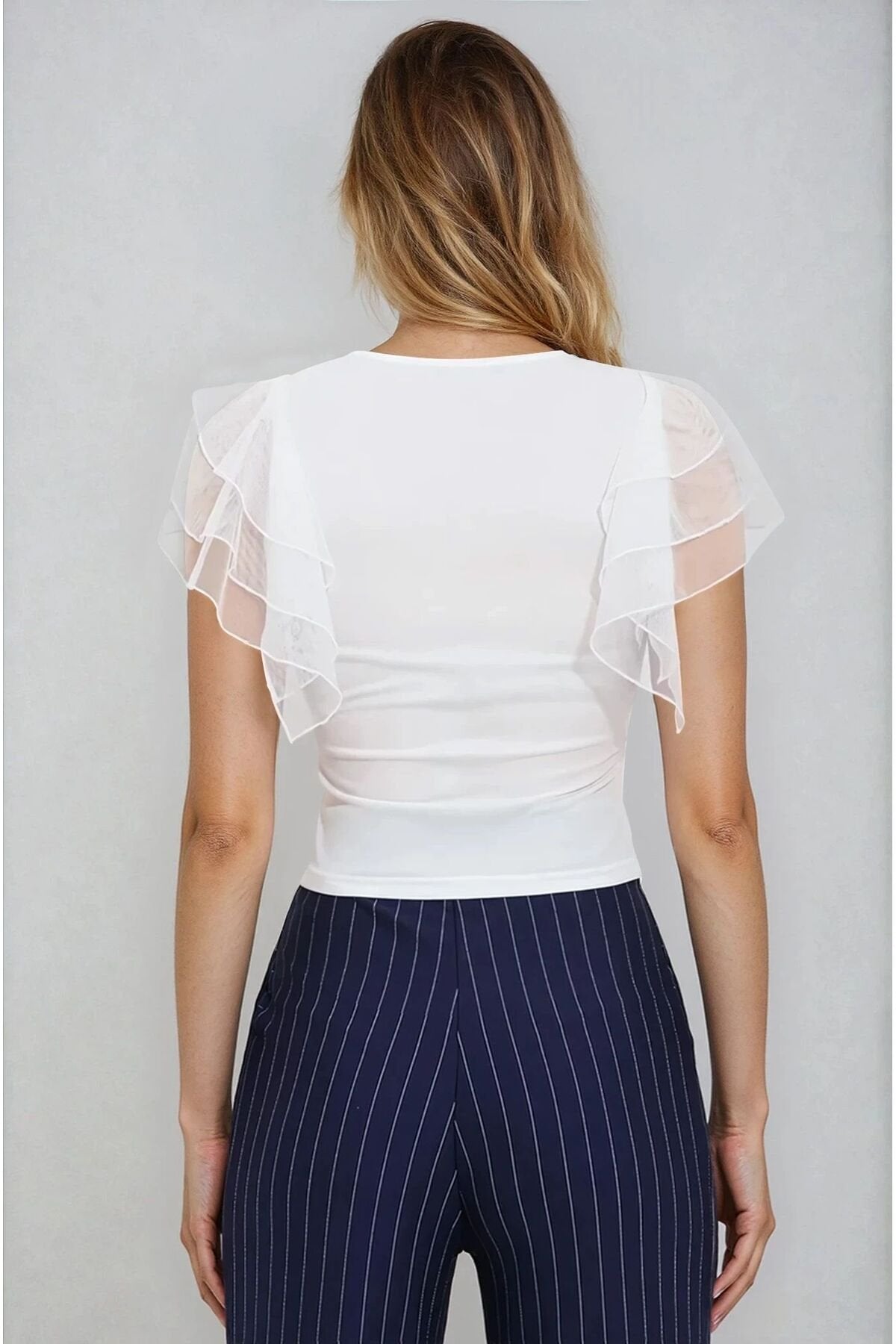 KADIN DÜĞME DETAYLI KOLU TÜLLÜ ESNEK ÖRME KUMAŞ BLUZ