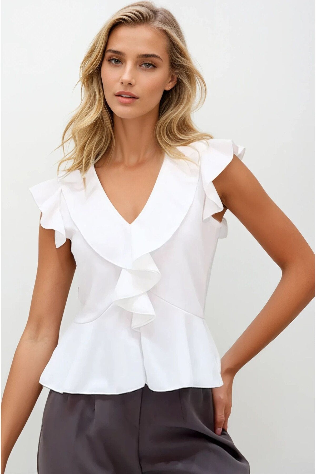 KADIN V YAKA VOLANLI ESNEK ÖRME KUMAŞ BLUZ