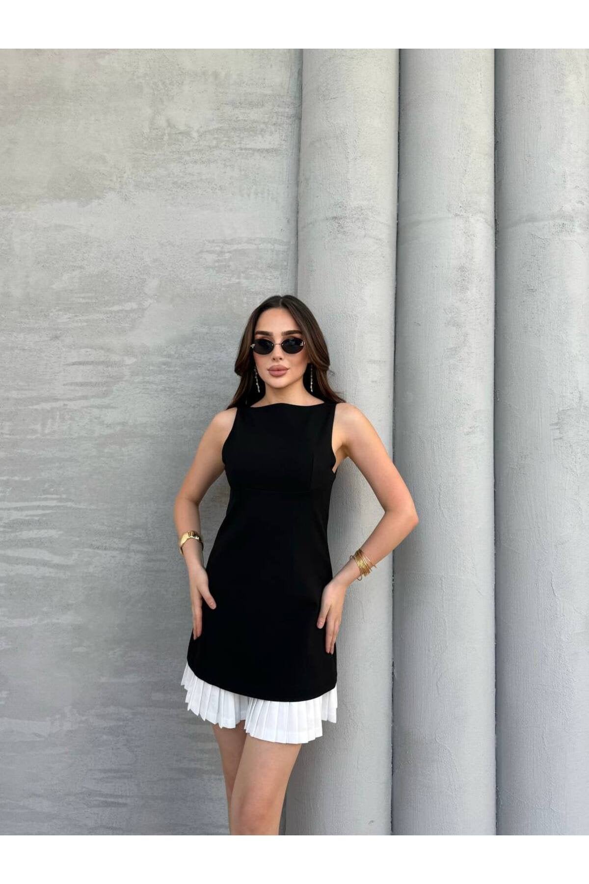 KADIN ETEĞİ PİLİSE DETAYLI ATLAS KUMAŞ KOLSUZ ELBİSE