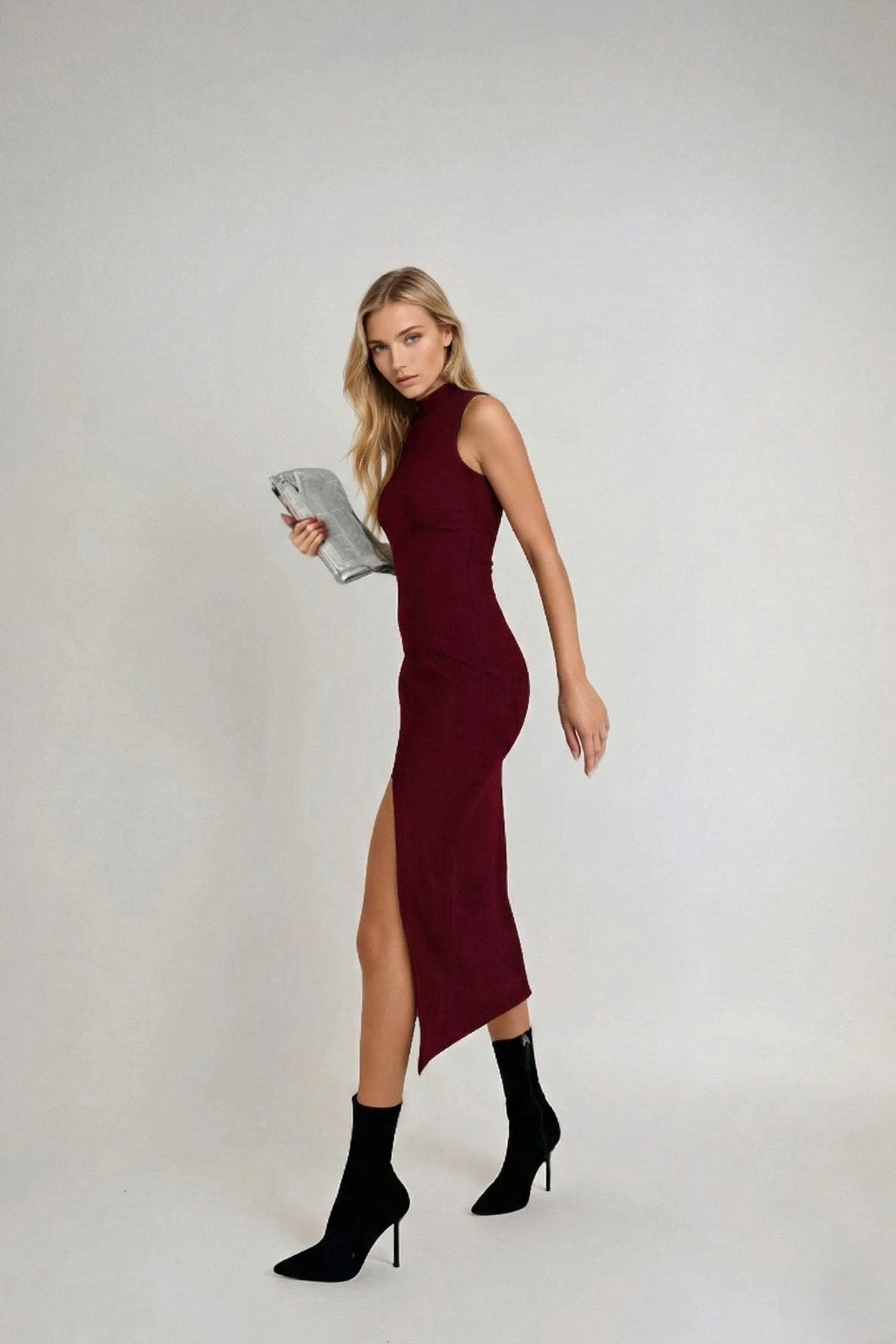 KADIN DİK YAKA KOLSUZ ESNEK KUMAŞ YIRTMAÇLI ELBİSE