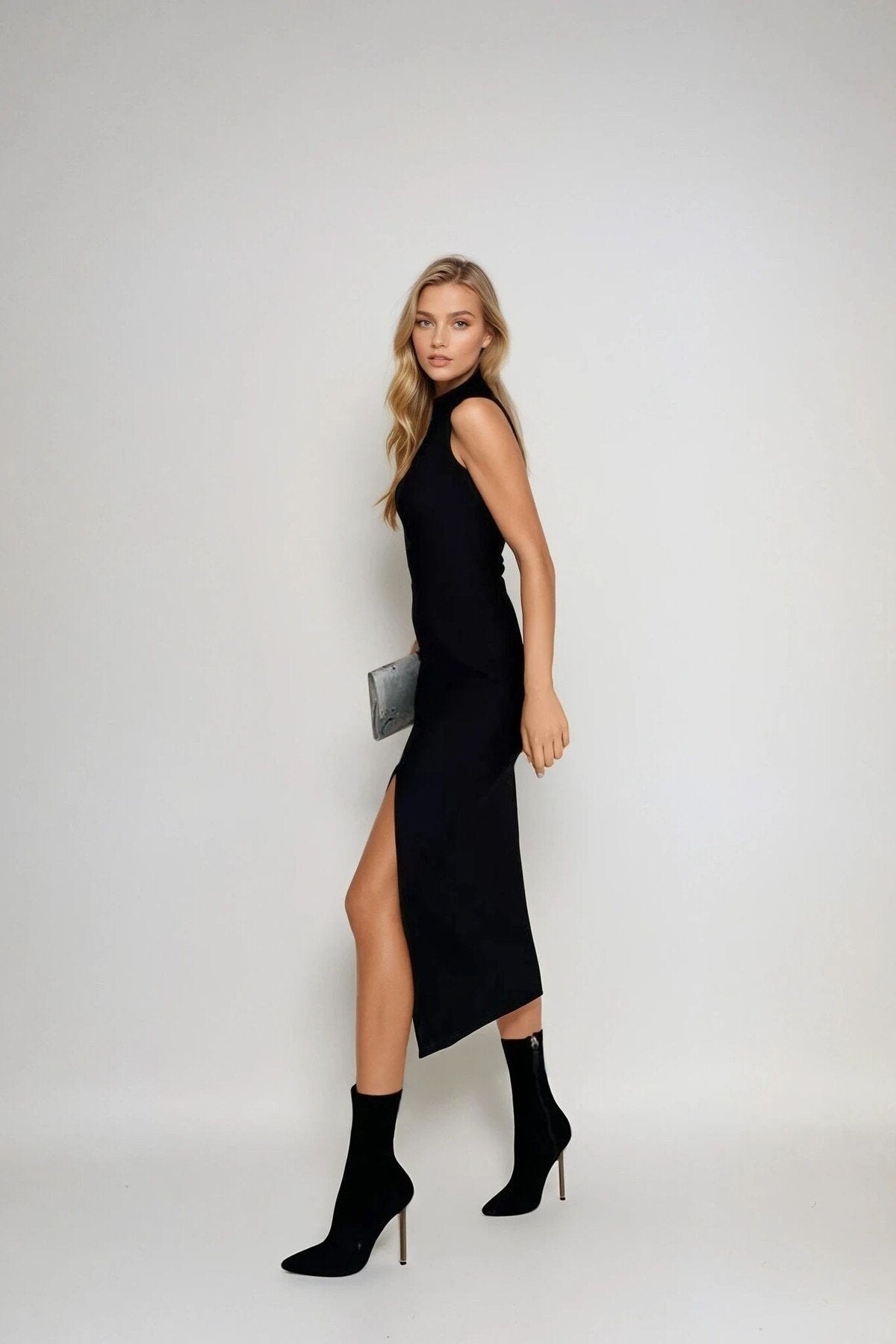 KADIN DİK YAKA KOLSUZ ESNEK KUMAŞ YIRTMAÇLI ELBİSE