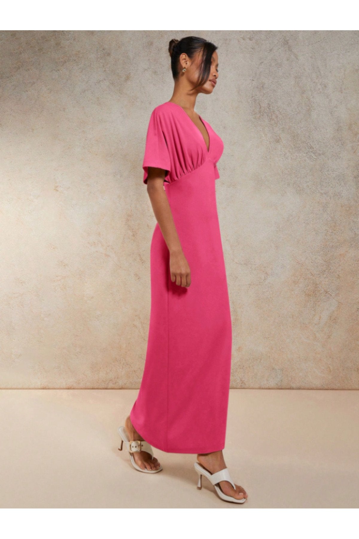 KADIN V YAKA MELEK KOL GÖĞSÜ BÜZGÜ DETAYLI ESNEK ÖRME KUMAŞ UZUN BOY ELBİSE