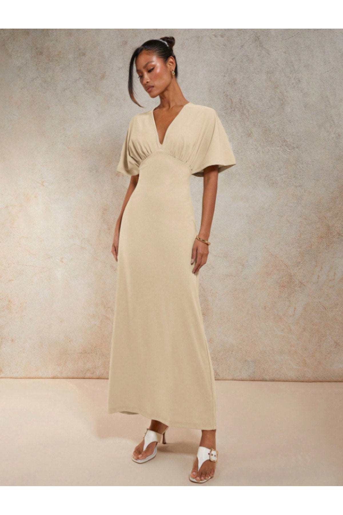 KADIN V YAKA MELEK KOL GÖĞSÜ BÜZGÜ DETAYLI ESNEK ÖRME KUMAŞ UZUN BOY ELBİSE