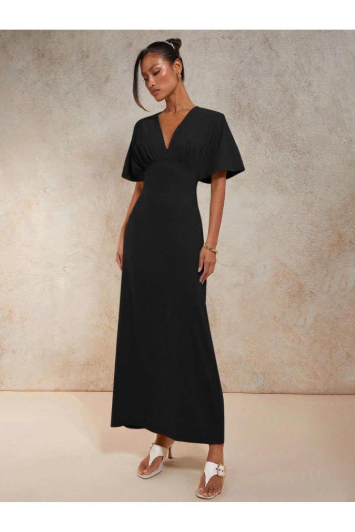 KADIN V YAKA MELEK KOL GÖĞSÜ BÜZGÜ DETAYLI ESNEK ÖRME KUMAŞ UZUN BOY ELBİSE