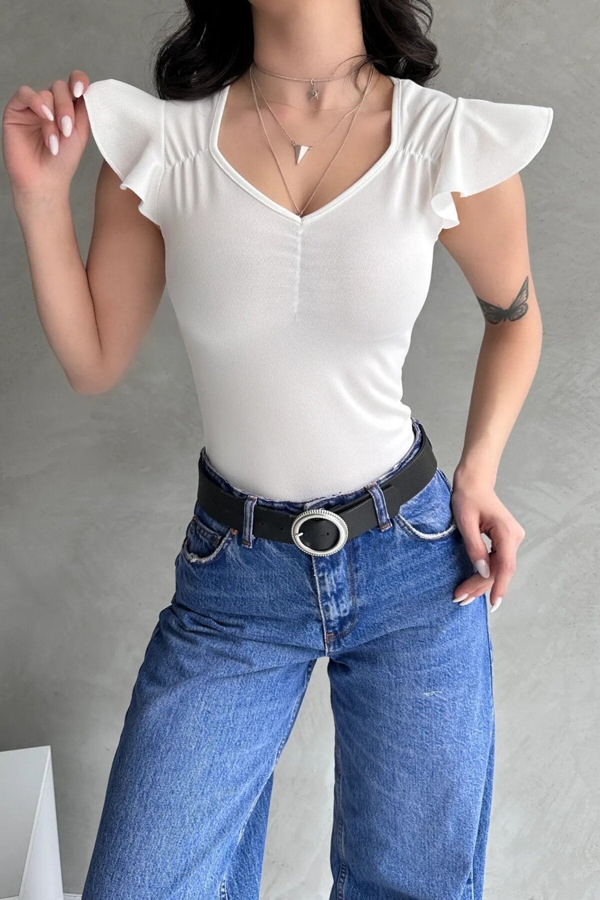 KADIN KALP YAKA ÖNÜ BÜZGÜLÜ OMUZLARI FIRFIRLI ESNEK ÖRME KUMAŞ BLUZ