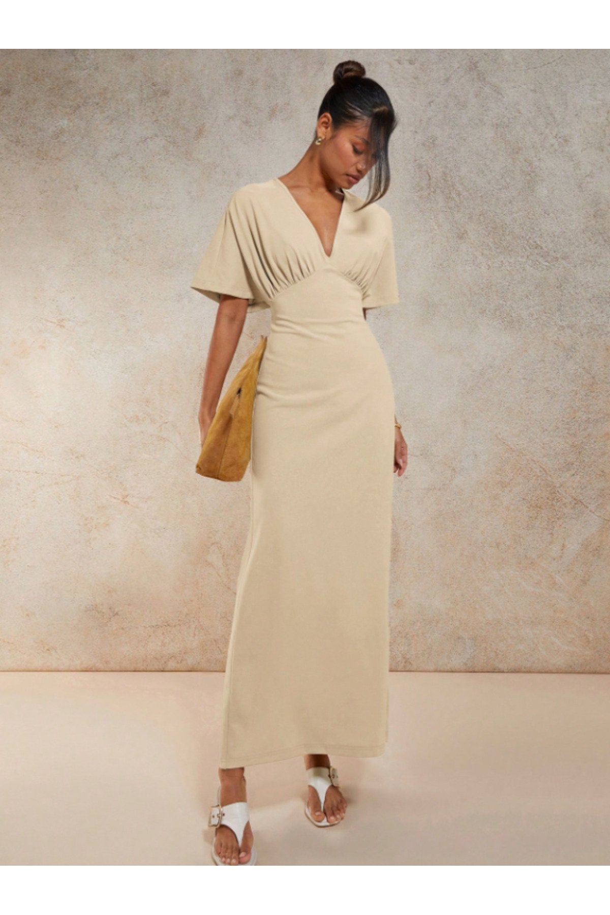 KADIN V YAKA MELEK KOL GÖĞSÜ BÜZGÜ DETAYLI ESNEK ÖRME KUMAŞ UZUN BOY ELBİSE